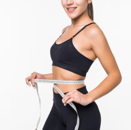 young-fitness-woman-measure-with-tape-her-belly-isolated-white-wall_231208-1704
